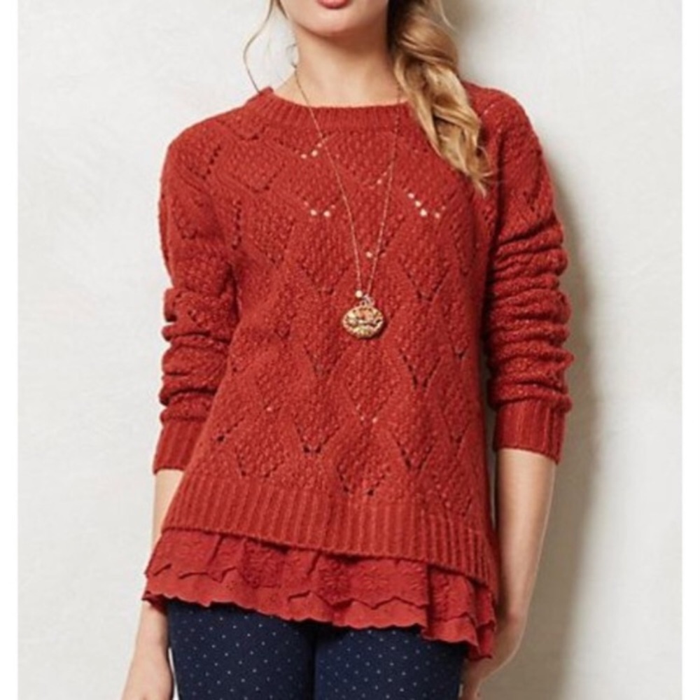 Cozy Anthropologie sweater with buttons on back